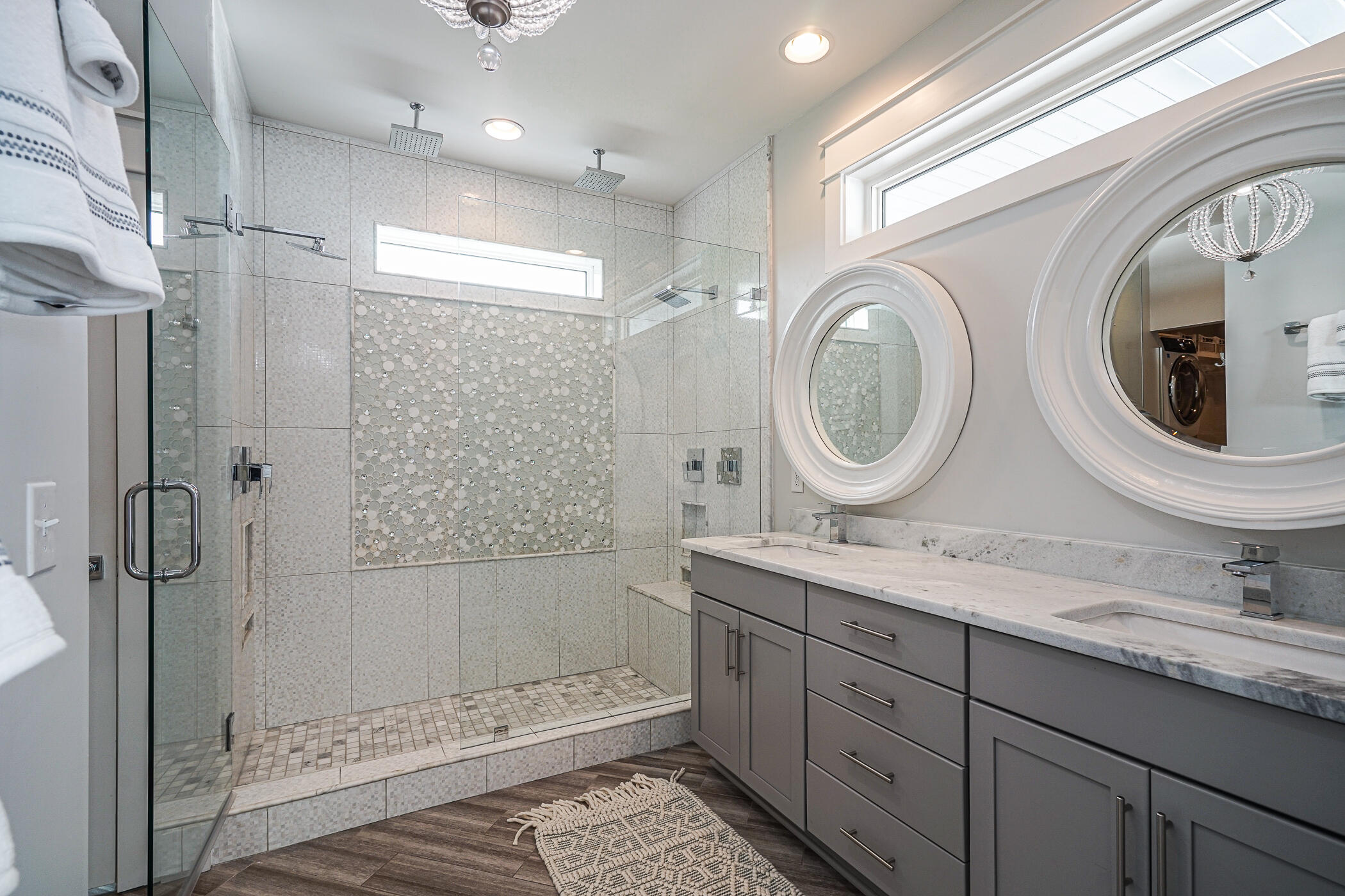 31 Conscience Way Santa Rosa Beach, FL 32459 - Photo 44 of 70 a bathroom with a double vanity sink a toilet and shower
