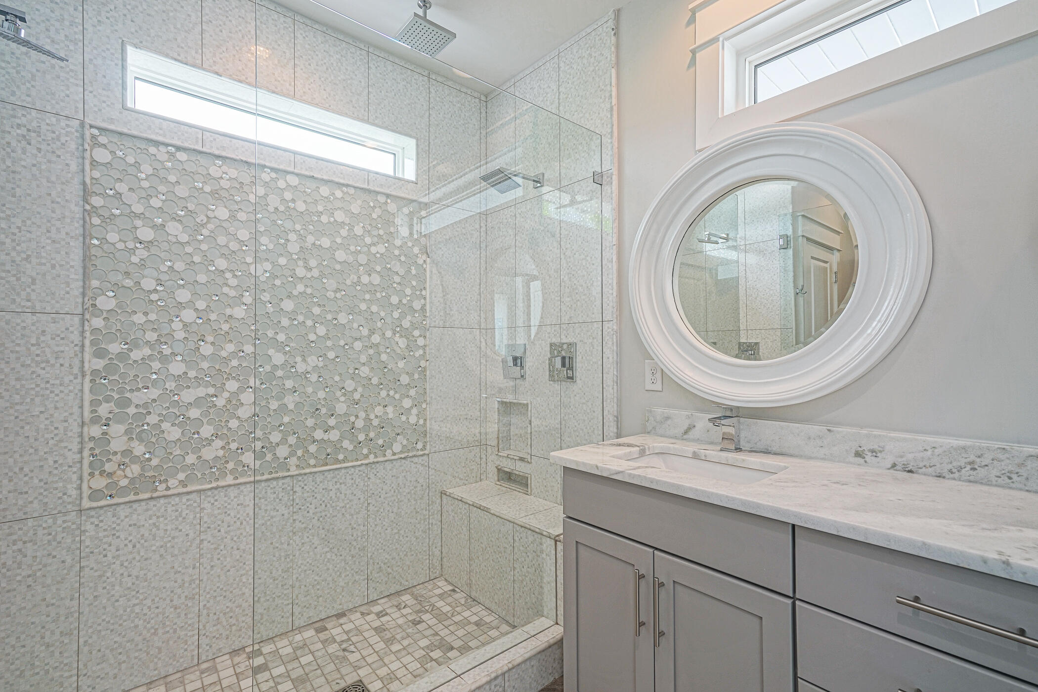 31 Conscience Way Santa Rosa Beach, FL 32459 - Photo 66 of 70 a bathroom with a granite countertop sink a mirror and shower