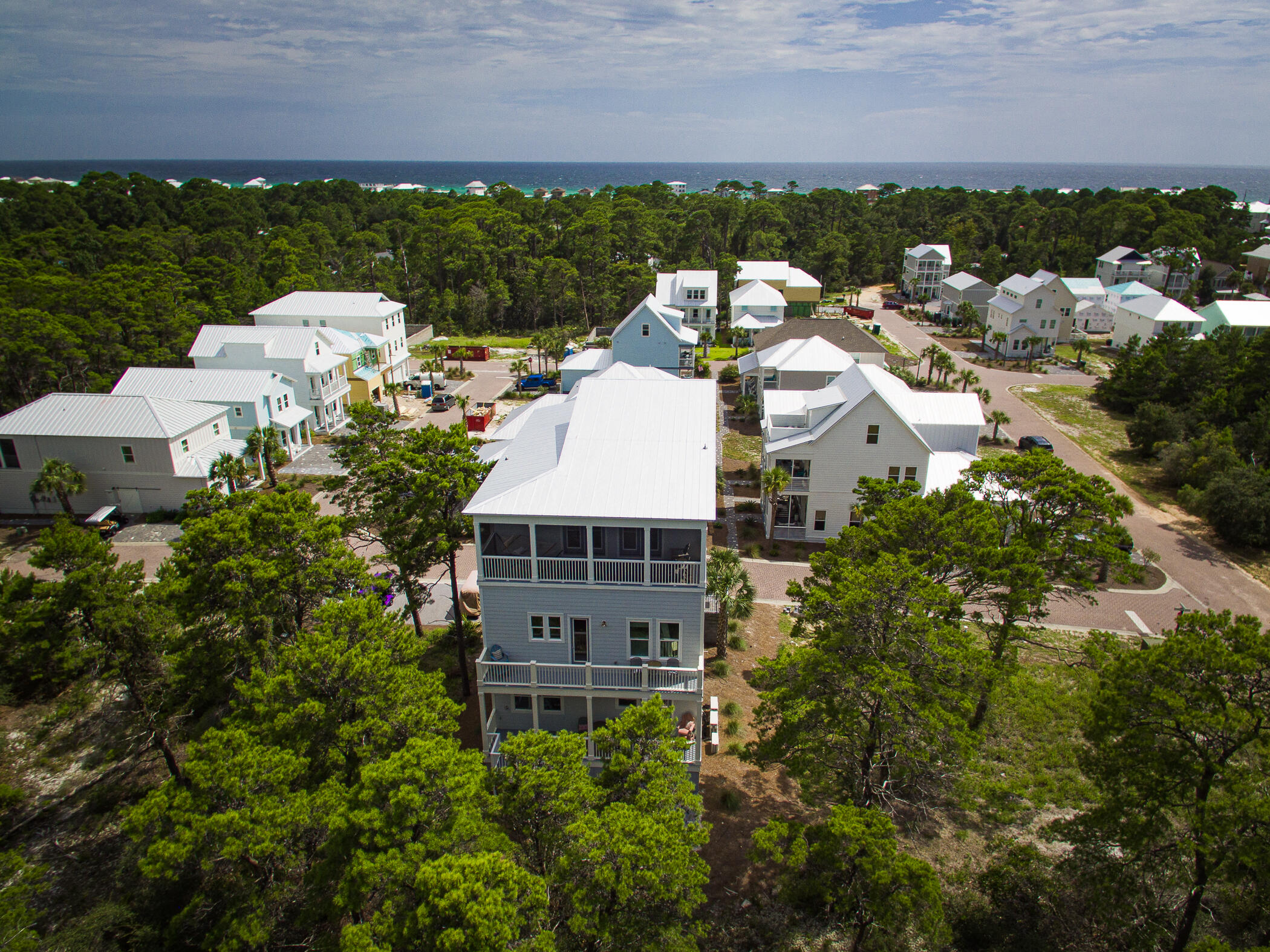 31 Conscience Way Santa Rosa Beach, FL 32459 - Photo 69 of 70 a aerial view of a house with a yard and lake view