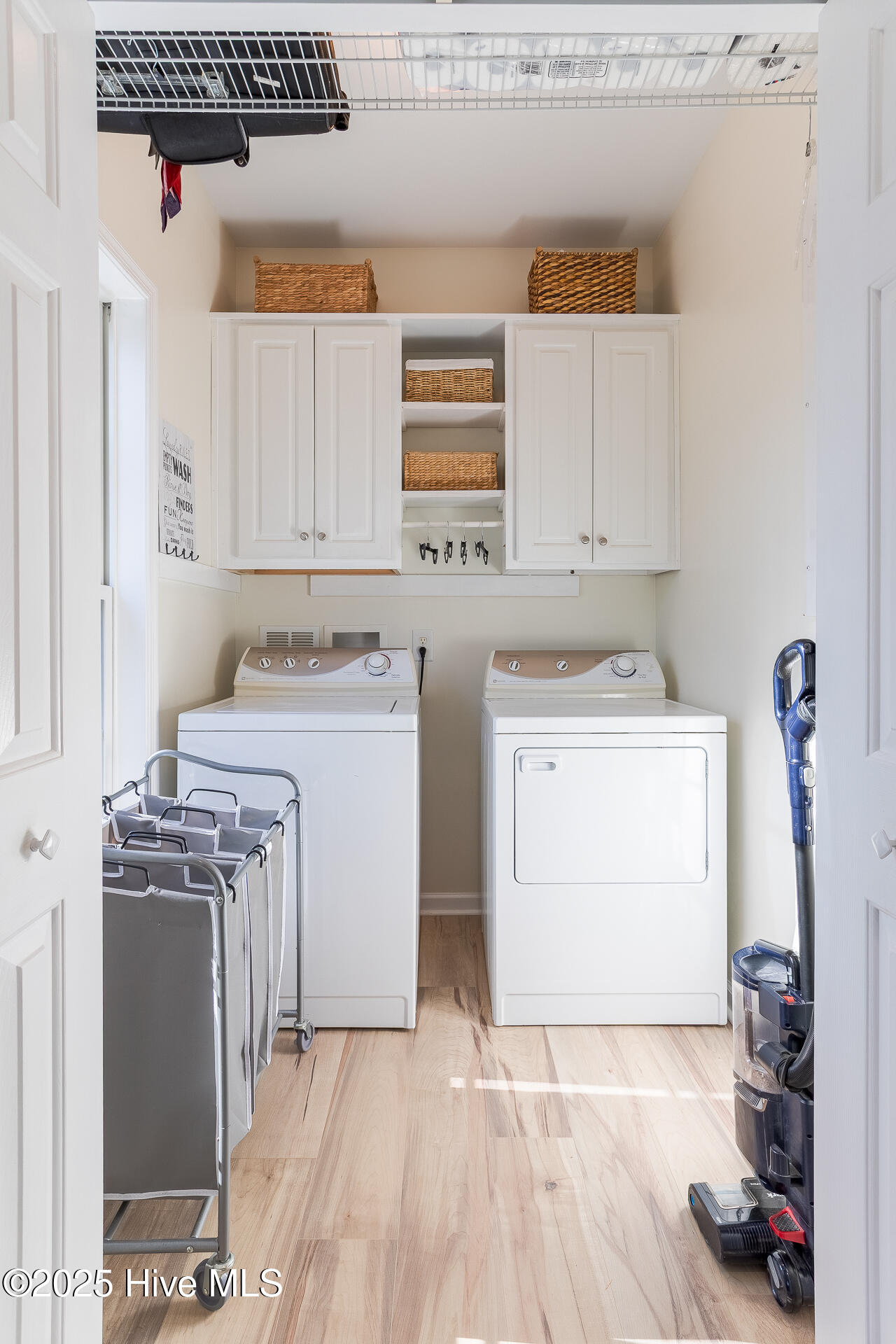 107 Bayview Drive Merritt, NC 28556 - Photo 31 of 66 Laundry & Closet in Primary Bedroom