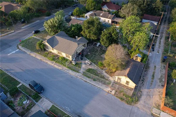 an aerial view of house with yard