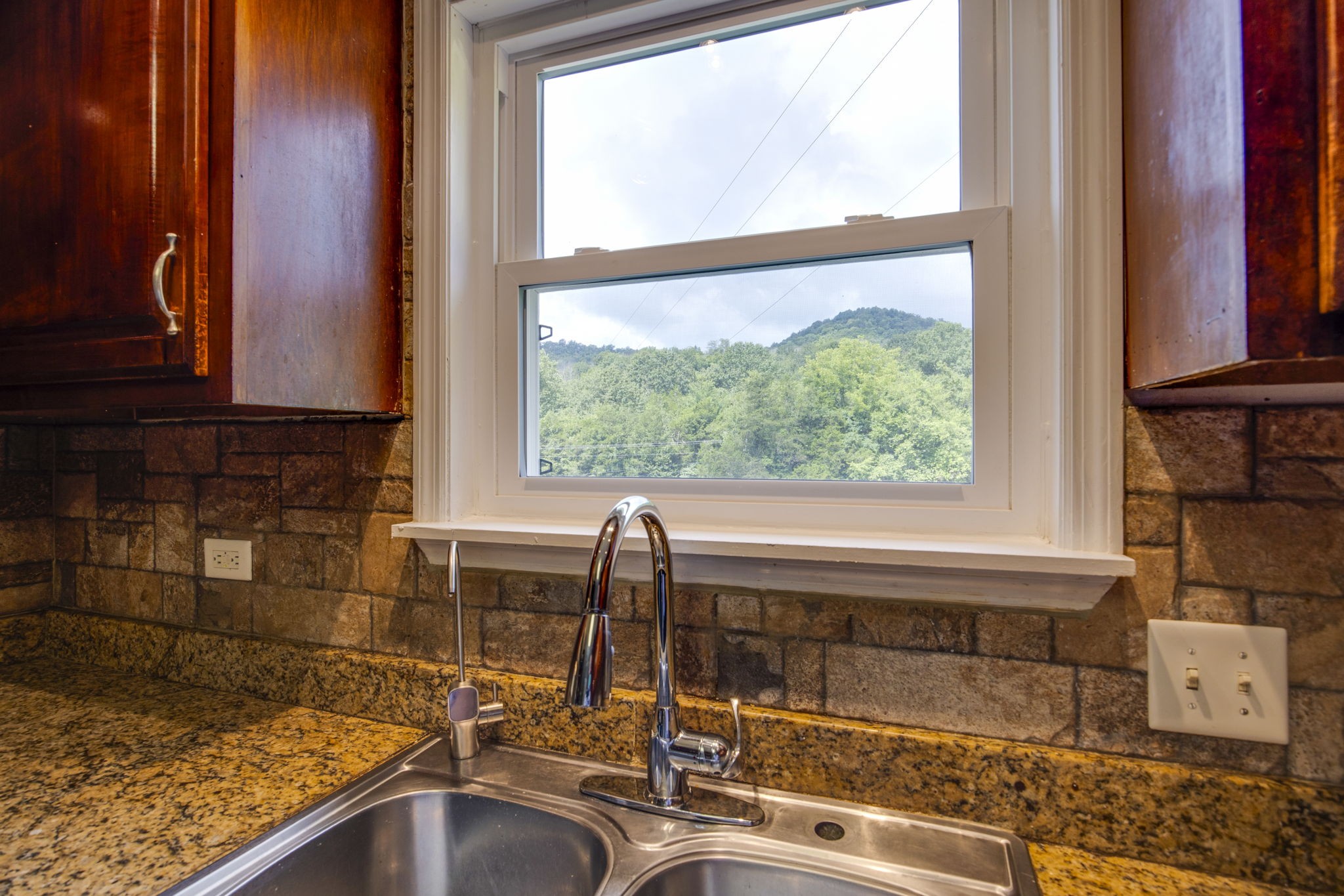 3203 Statesville Road Watertown, TN 37184 - Photo 37 of 56 a kitchen with a sink and a large window
