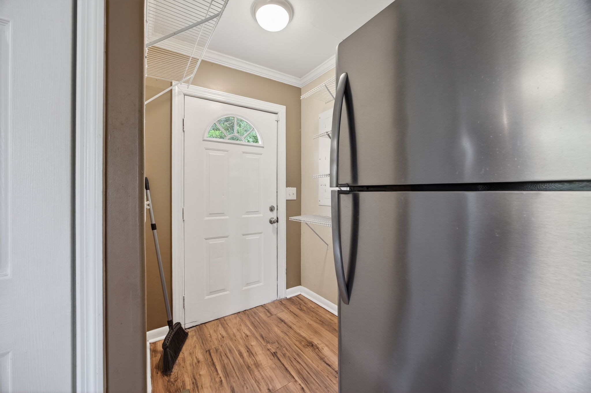 3203 Statesville Road Watertown, TN 37184 - Photo 38 of 56 a view of closet with wooden floor
