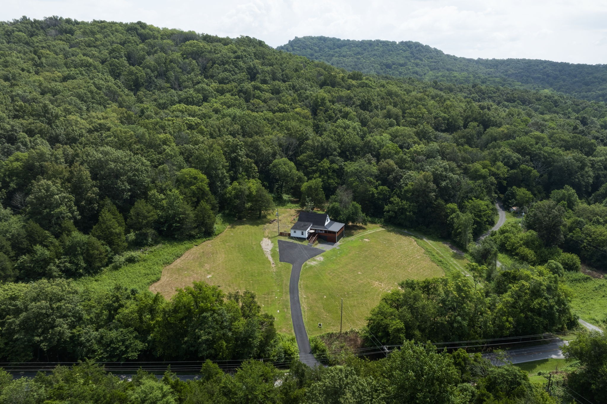 3203 Statesville Road Watertown, TN 37184 - Photo 43 of 56 an aerial view of a house with a yard