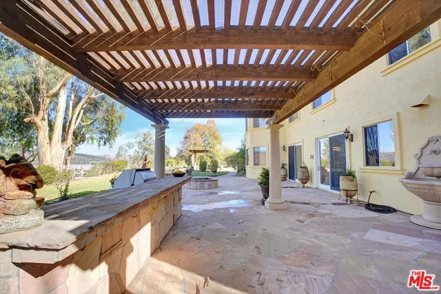 a view of a backyard of a house