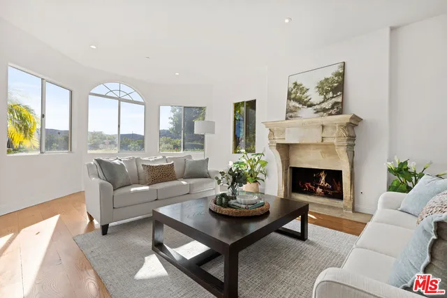 a stove top oven sitting inside of a kitchen