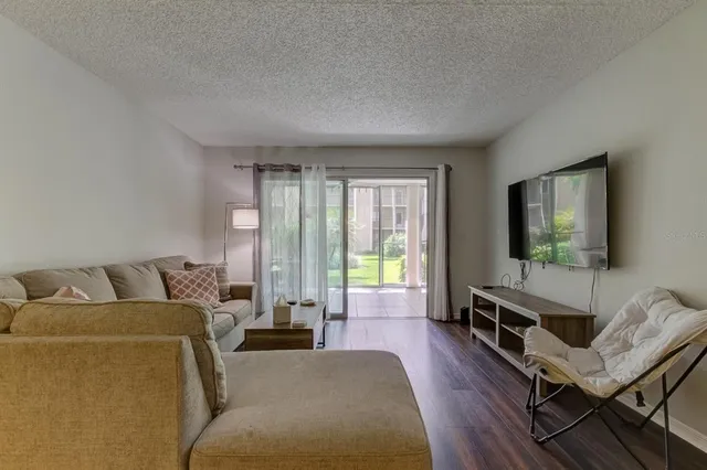a living room with furniture and a couch