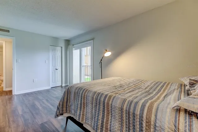 front view of a building with a garden