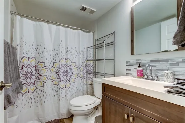 a view of a backyard with palm tree