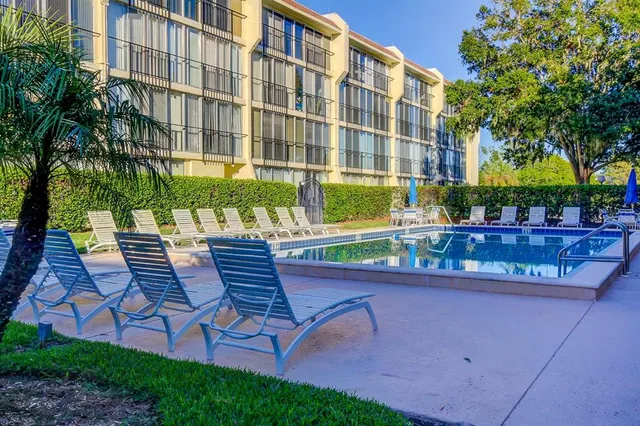 a view of a terrace with sitting area