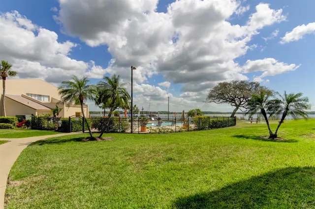 a view of a chairs and tables in the patio