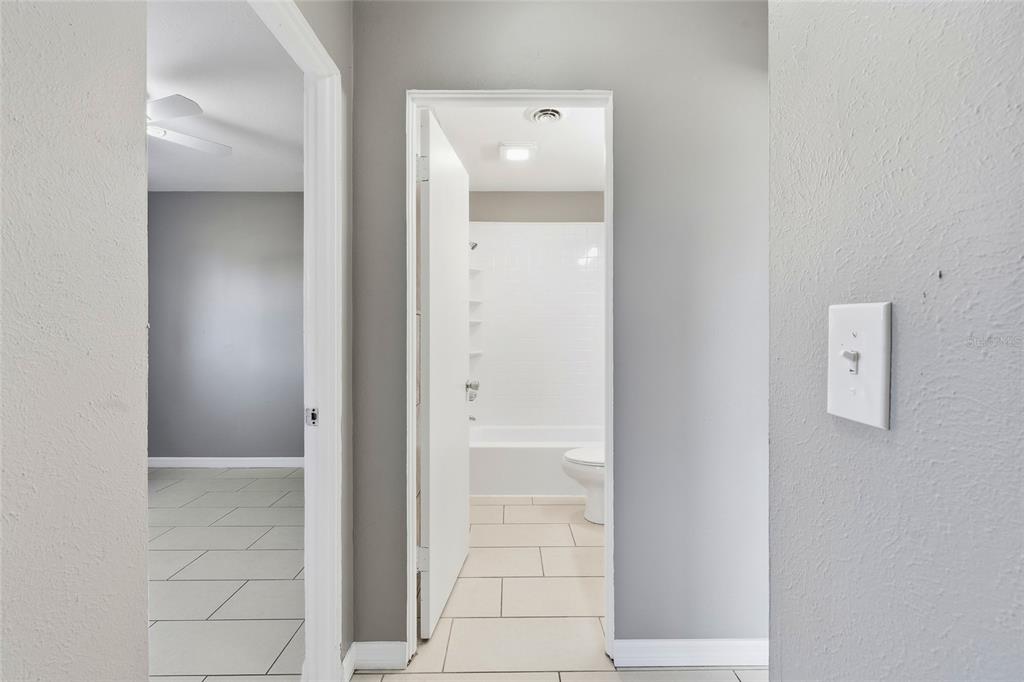 363 Glen Oak Road Venice, FL 34293 - Photo 37 of 53 a view of a bathroom from a hallway