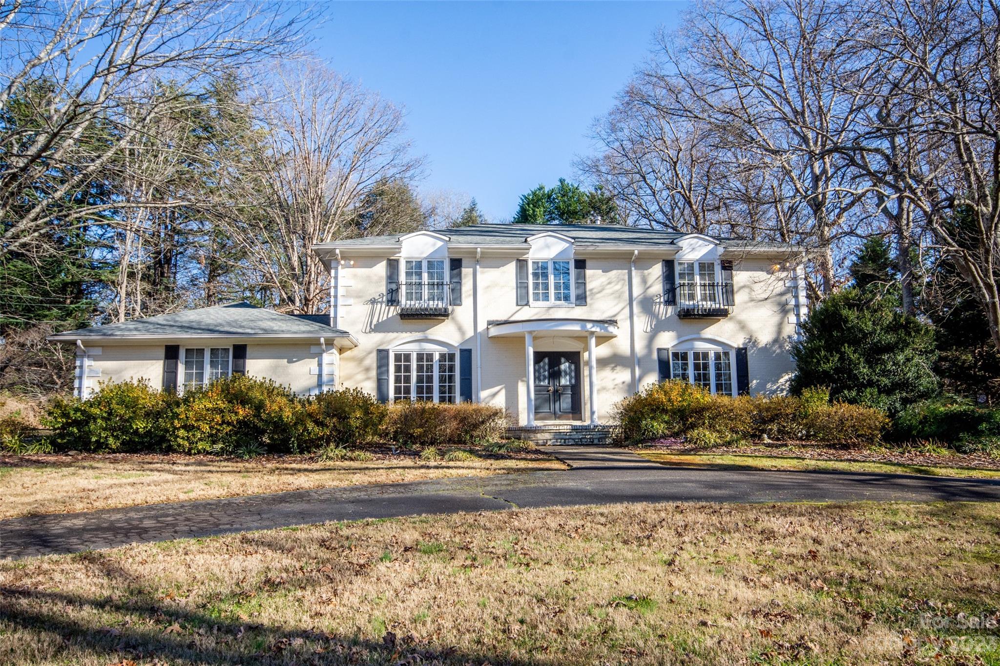 321 St Andrews Road Statesville, NC 28625 - Photo 1 of 19 a front view of residential houses with yard and trees