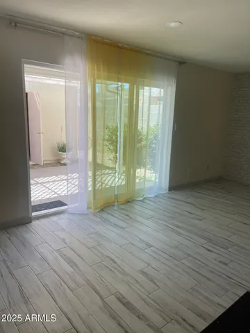 a bathroom with a toilet a sink and shower