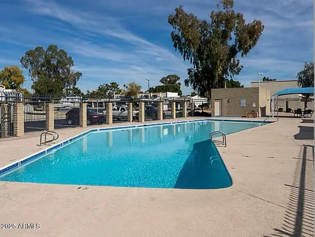 a kitchen with stainless steel appliances granite countertop a stove and a refrigerator