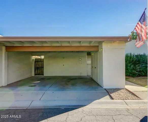 a view of a house with a street