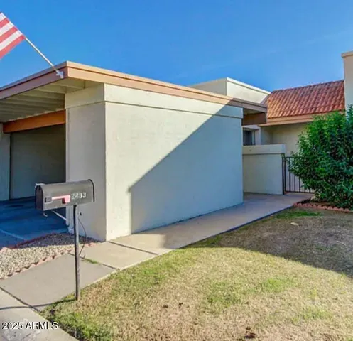 a view of backyard with potted plants