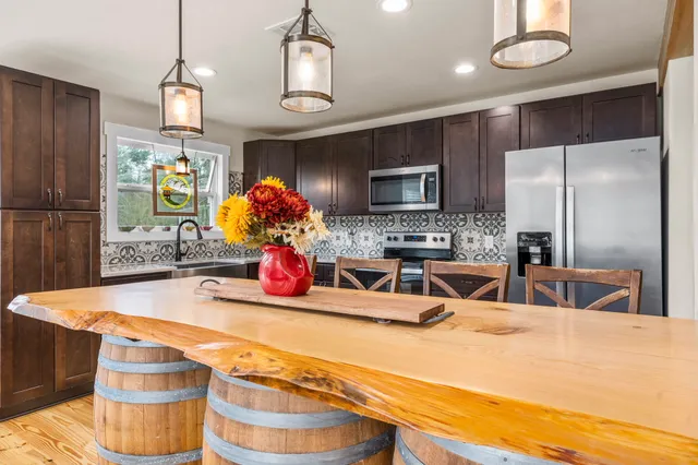a view of a dining room with furniture window and outside view