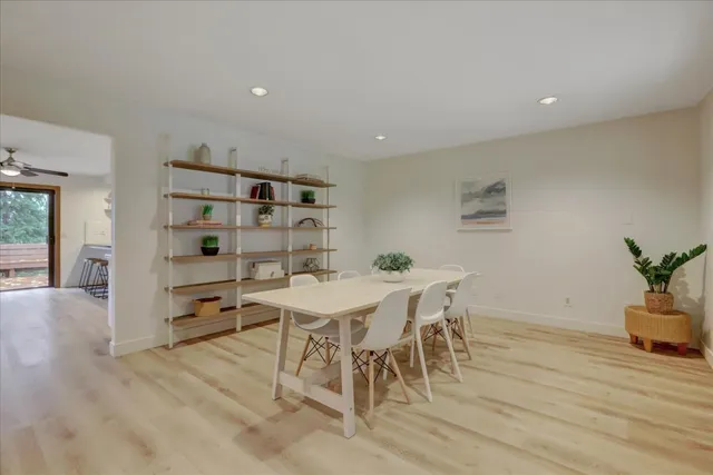 a bathroom with a sink vanity and mirror