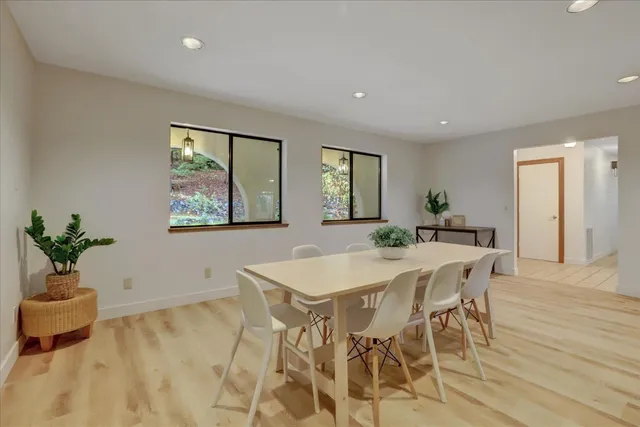 a view of balcony with wooden floor and fence