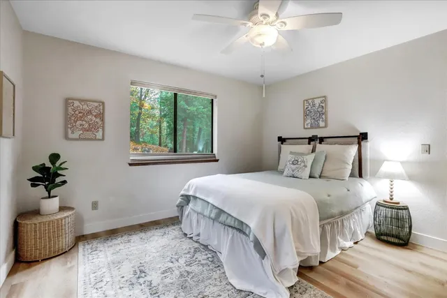 a backyard of a house with yard and outdoor seating