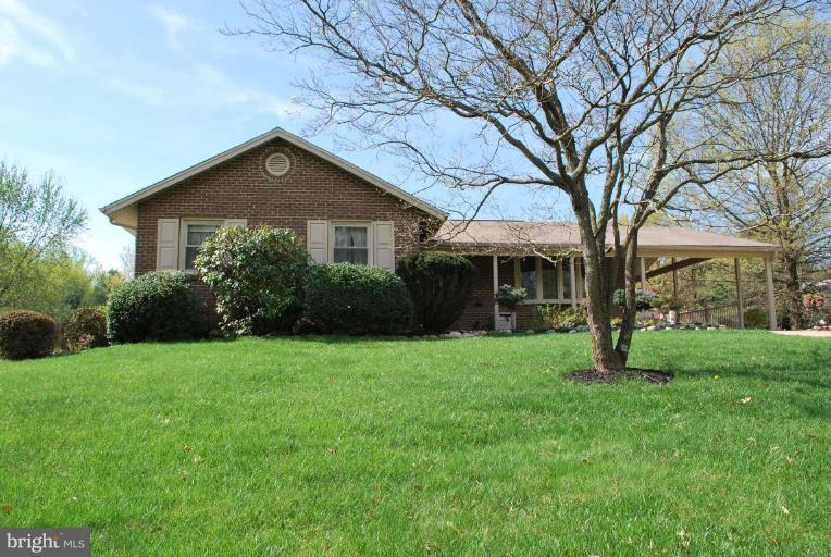 2013 Hopefield Road Silver Spring, MD 20905 - Photo 2 of 30 a front view of house with yard and green space