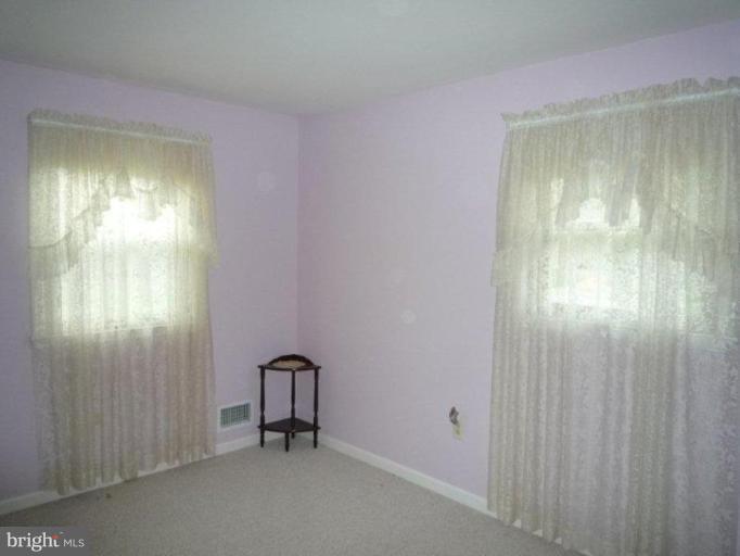 2013 Hopefield Road Silver Spring, MD 20905 - Photo 16 of 30 a view of a room with a mirror