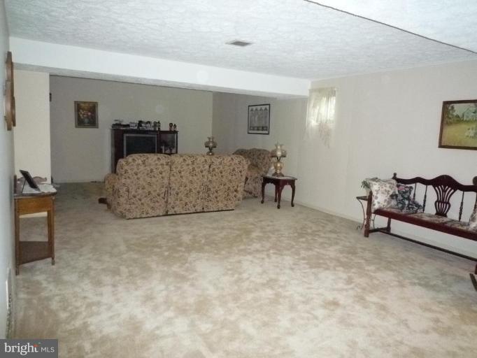 2013 Hopefield Road Silver Spring, MD 20905 - Photo 23 of 30 a living room with furniture and a couch