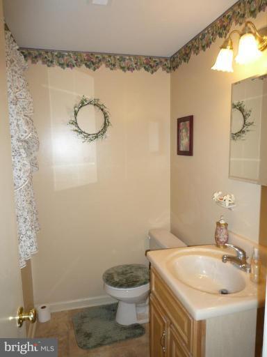 2013 Hopefield Road Silver Spring, MD 20905 - Photo 30 of 30 a bathroom with a sink a toilet and shower