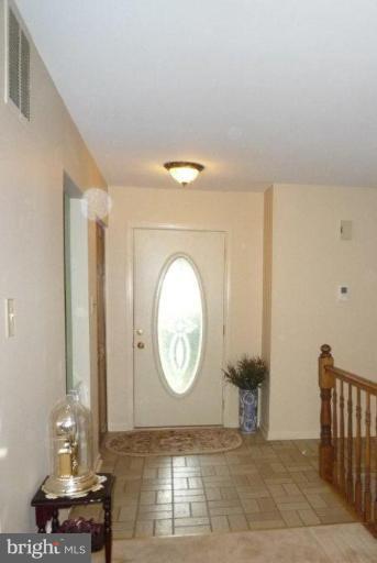 2013 Hopefield Road Silver Spring, MD 20905 - Photo 7 of 30 a view of a hallway with washer and dryer