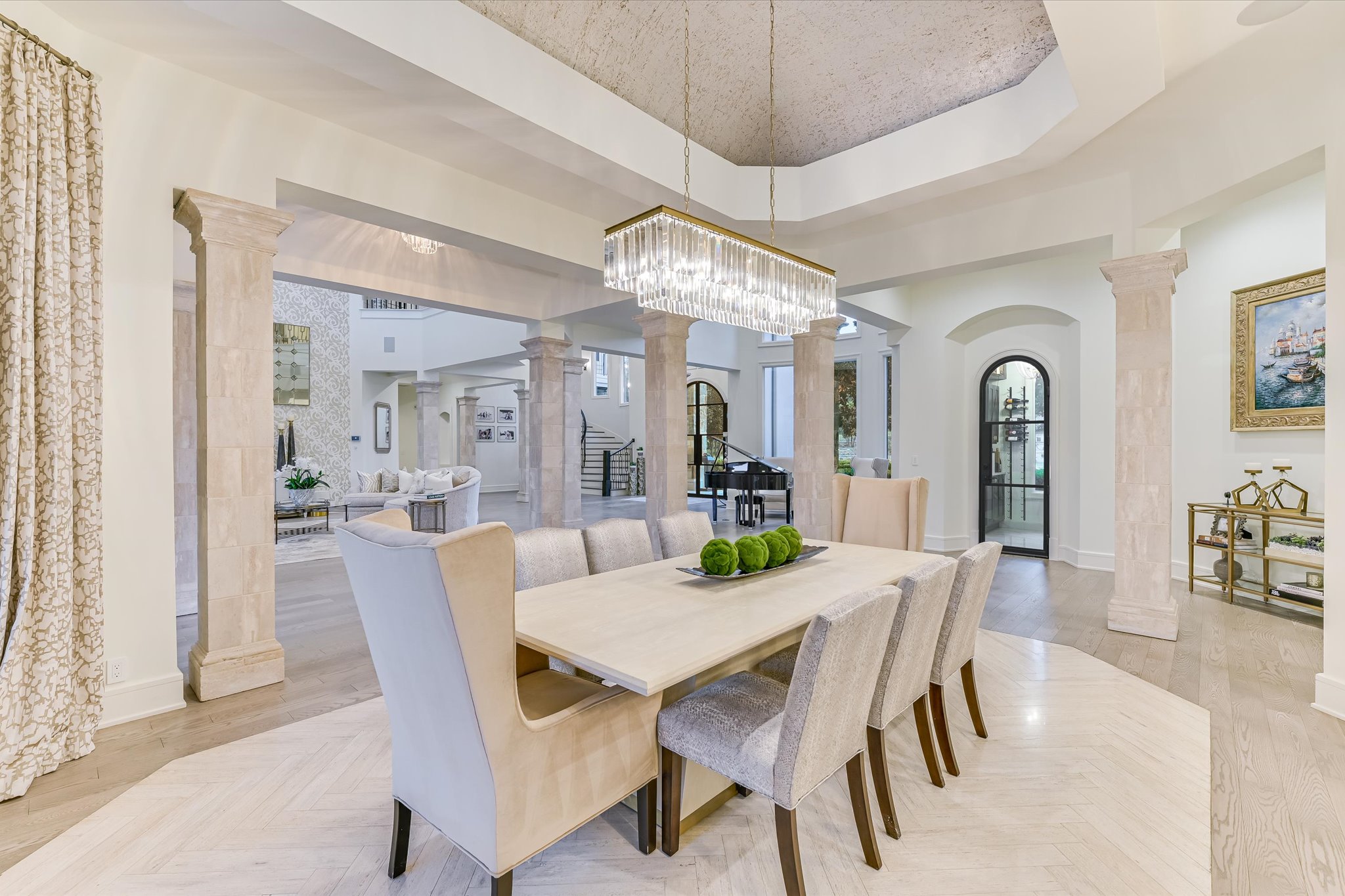 14132 Flat Top Ranch Road Austin, TX 78732 - Photo 11 of 40 a view of a dining room with furniture and chandelier