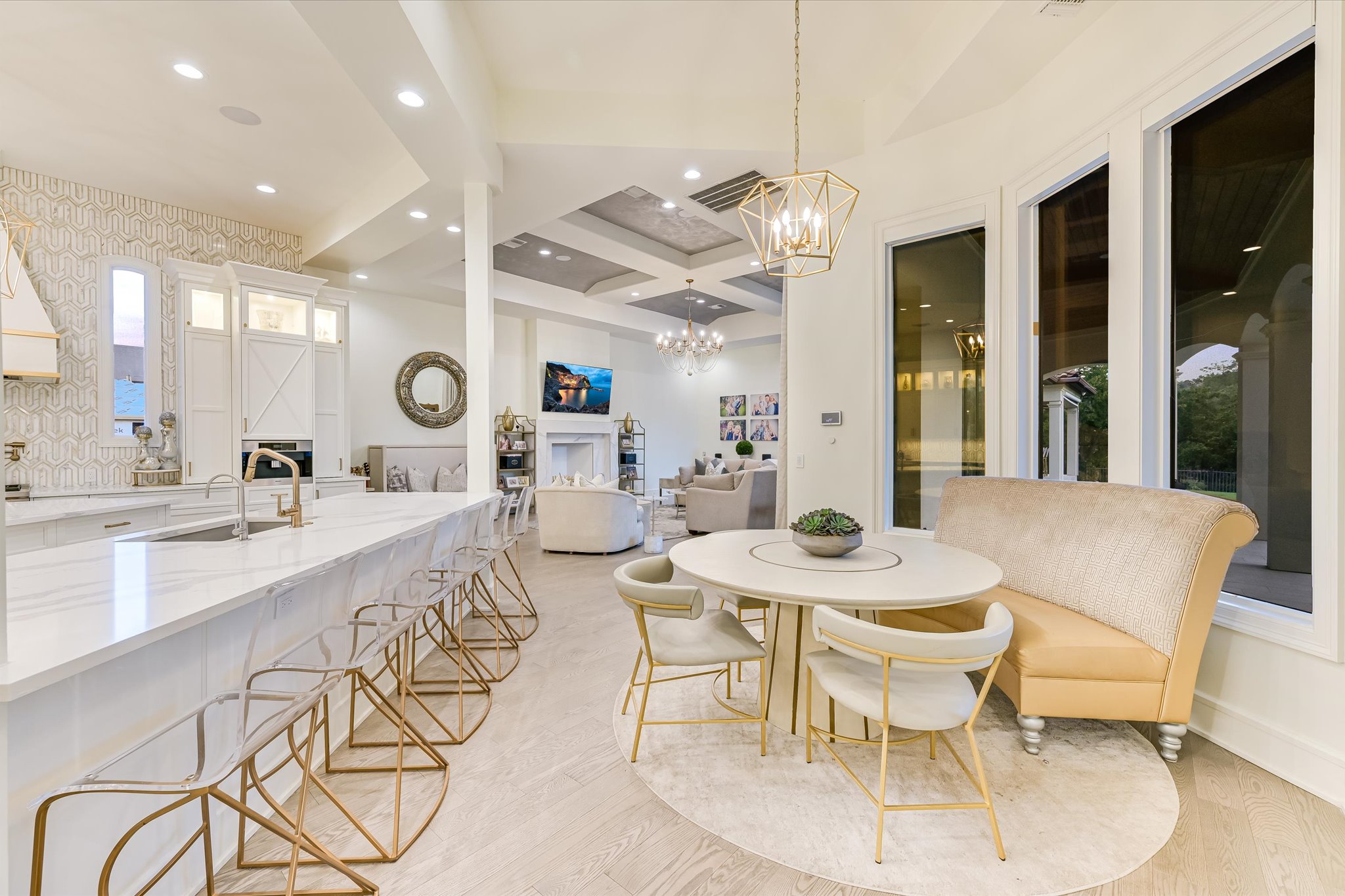 14132 Flat Top Ranch Road Austin, TX 78732 - Photo 13 of 40 a dining room with granite countertop a table and chairs in it