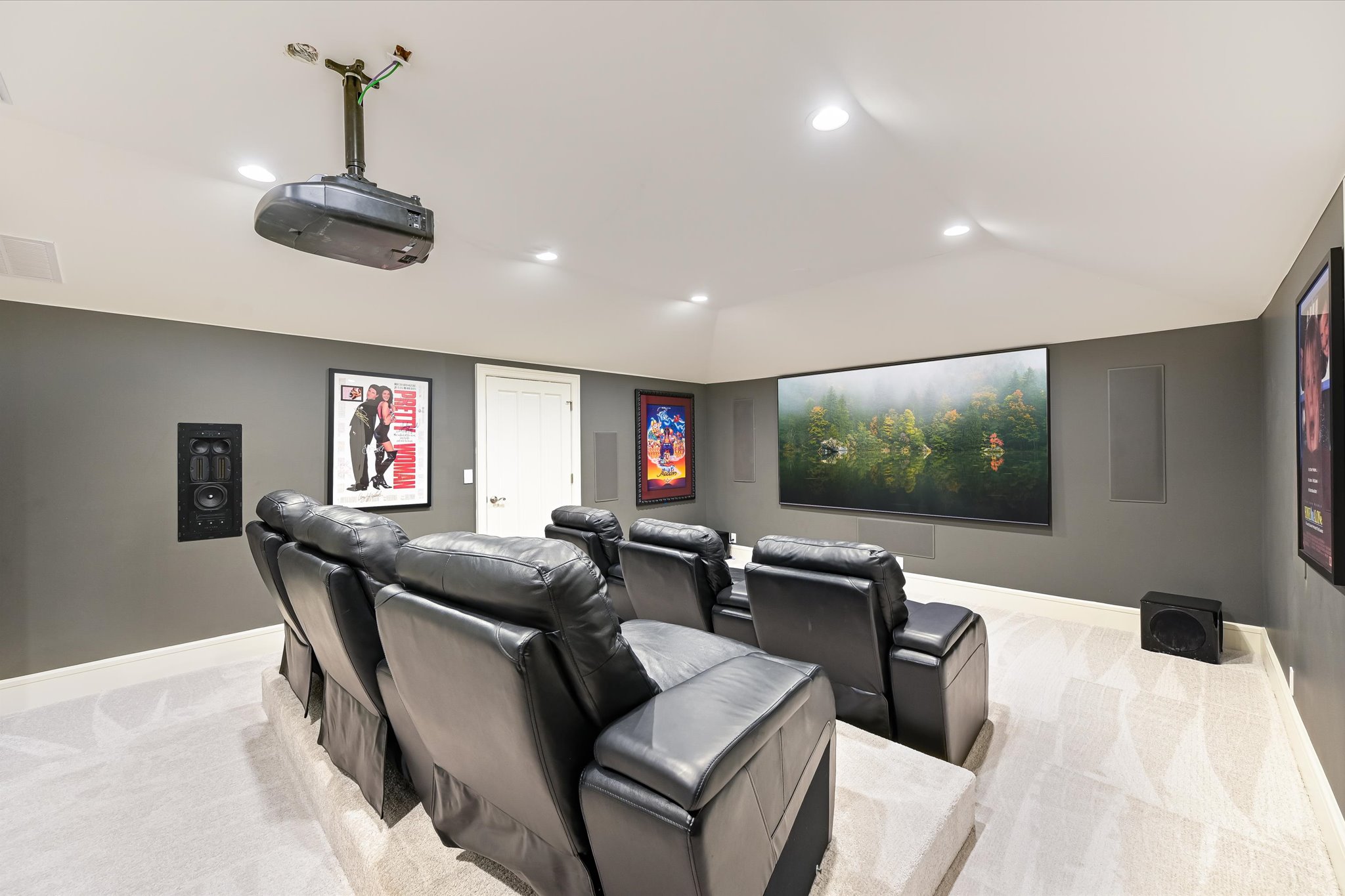 14132 Flat Top Ranch Road Austin, TX 78732 - Photo 19 of 40 a living room with furniture and a flat screen tv