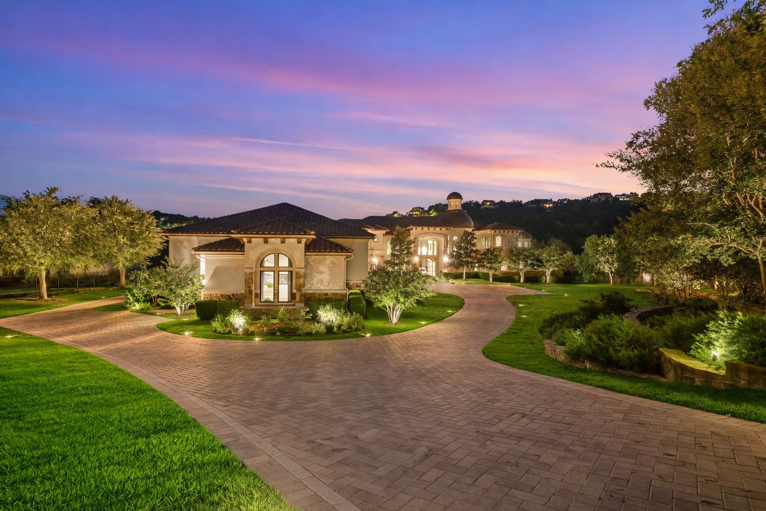 14132 Flat Top Ranch Road Austin, TX 78732 - Photo 2 of 40 a view of a street with a houses in the back