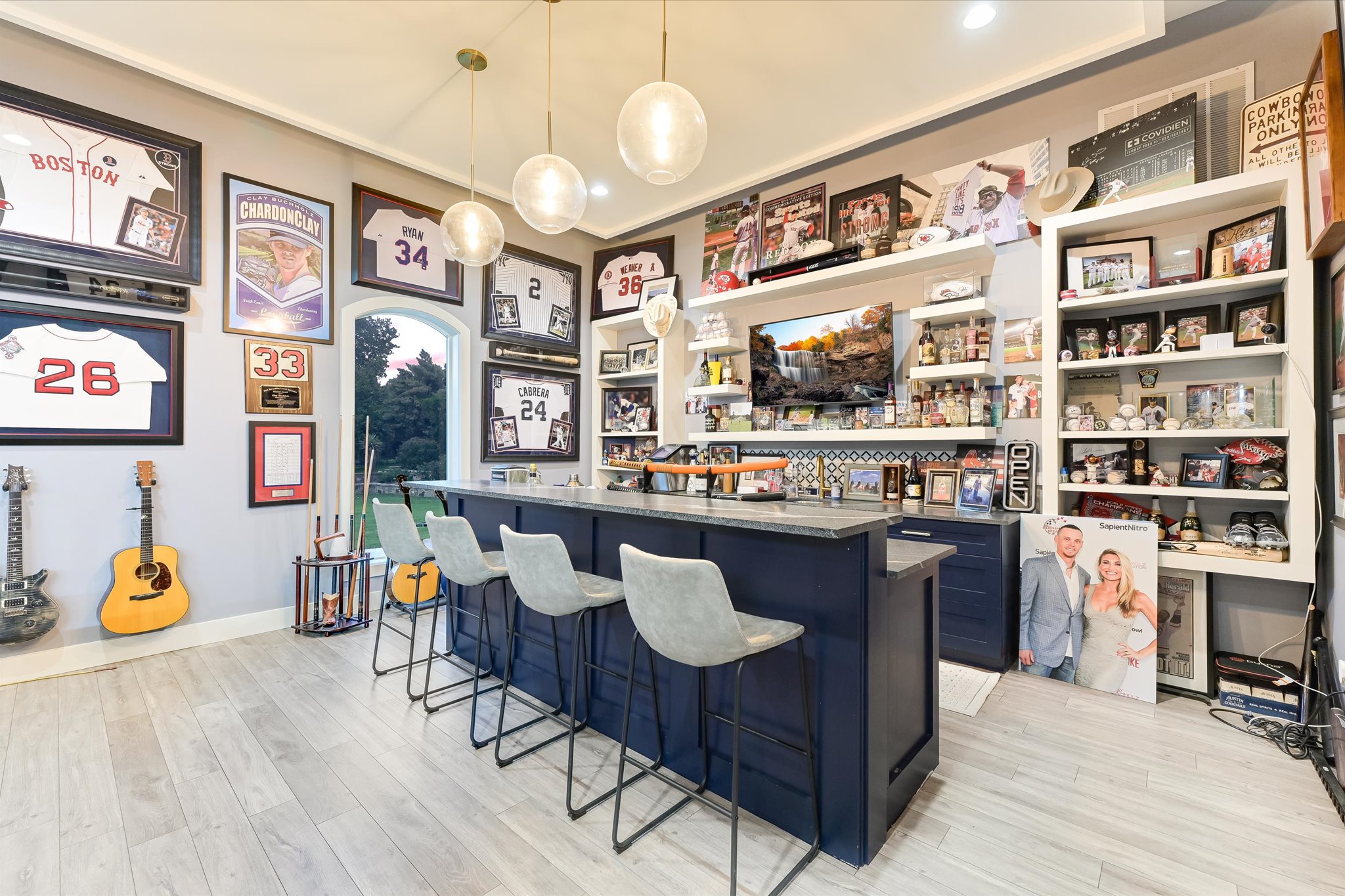 14132 Flat Top Ranch Road Austin, TX 78732 - Photo 22 of 40 a living room with stainless steel appliances kitchen island granite countertop furniture a rug and a kitchen view