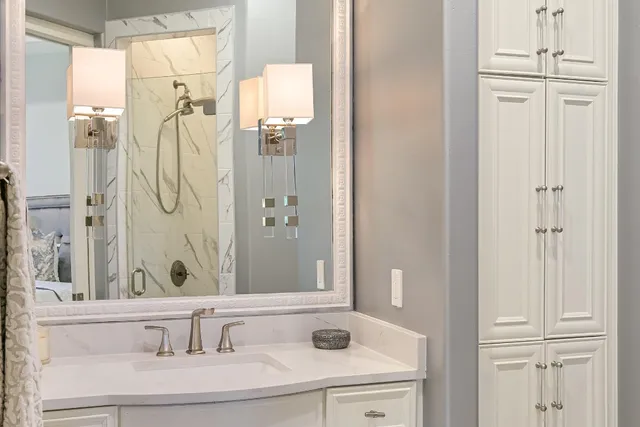 a bathroom with a sink and a mirror