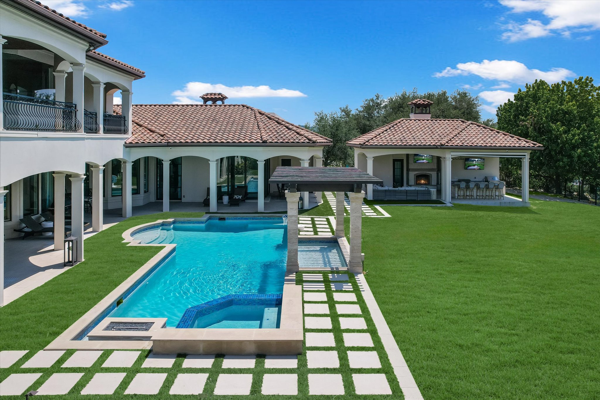 14132 Flat Top Ranch Road Austin, TX 78732 - Photo 38 of 40 a view of a house with a yard porch and sitting area