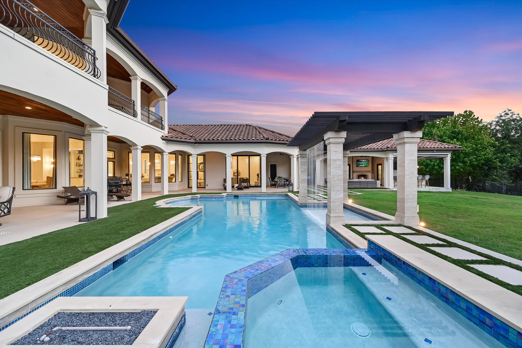 14132 Flat Top Ranch Road Austin, TX 78732 - Photo 4 of 40 a view of a house with a yard