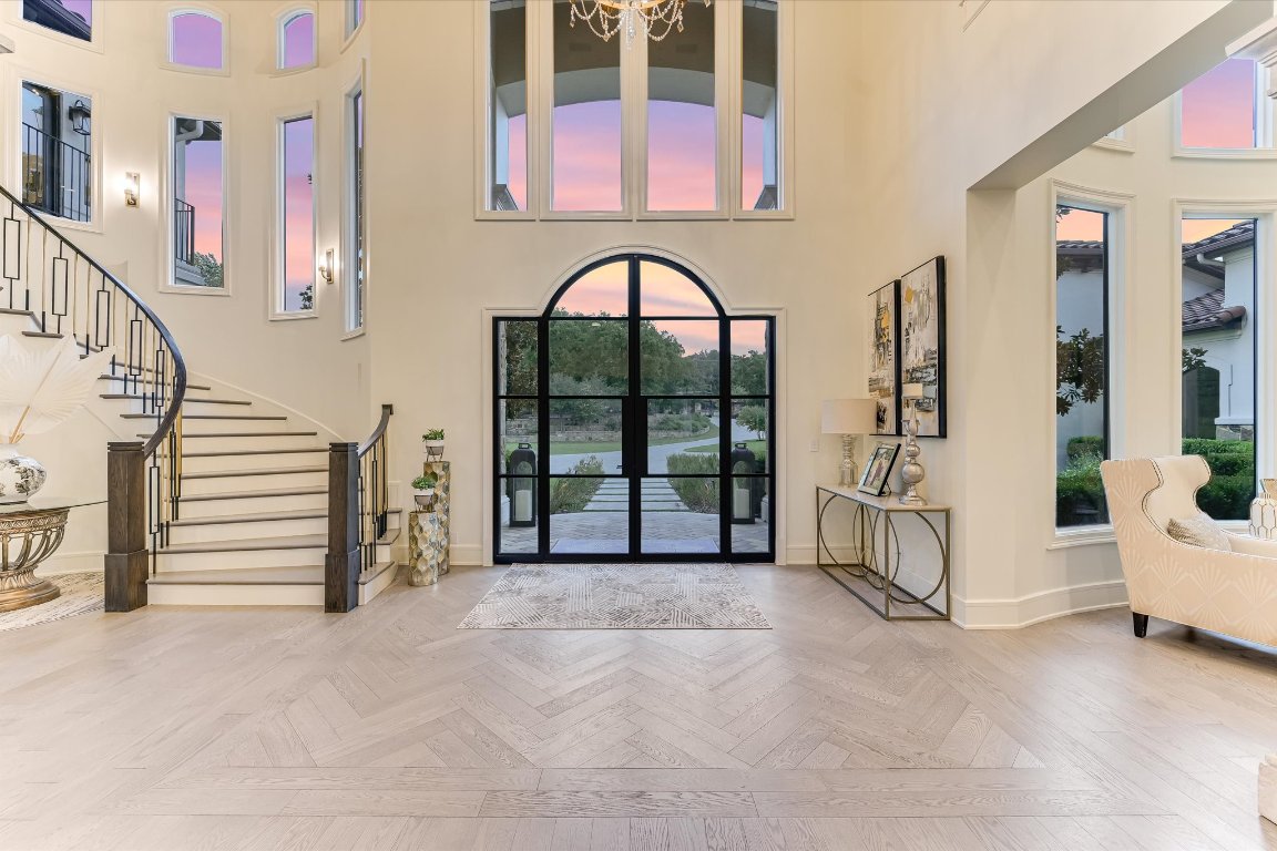 14132 Flat Top Ranch Road Austin, TX 78732 - Photo 8 of 40 a view of entryway with stairs and furniture