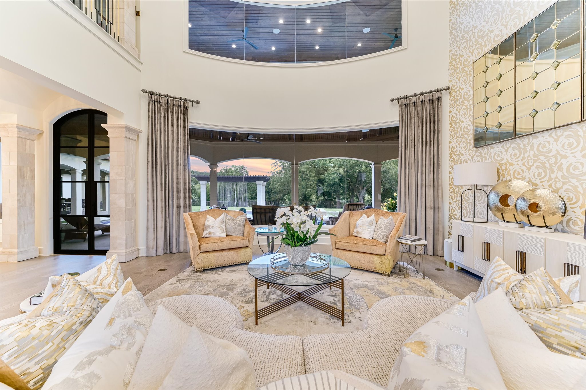 14132 Flat Top Ranch Road Austin, TX 78732 - Photo 9 of 40 a living room with furniture and a large window