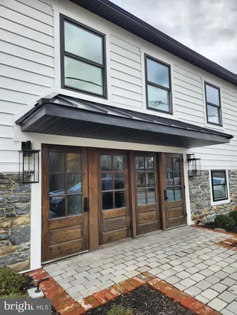 a view of a house and entrance