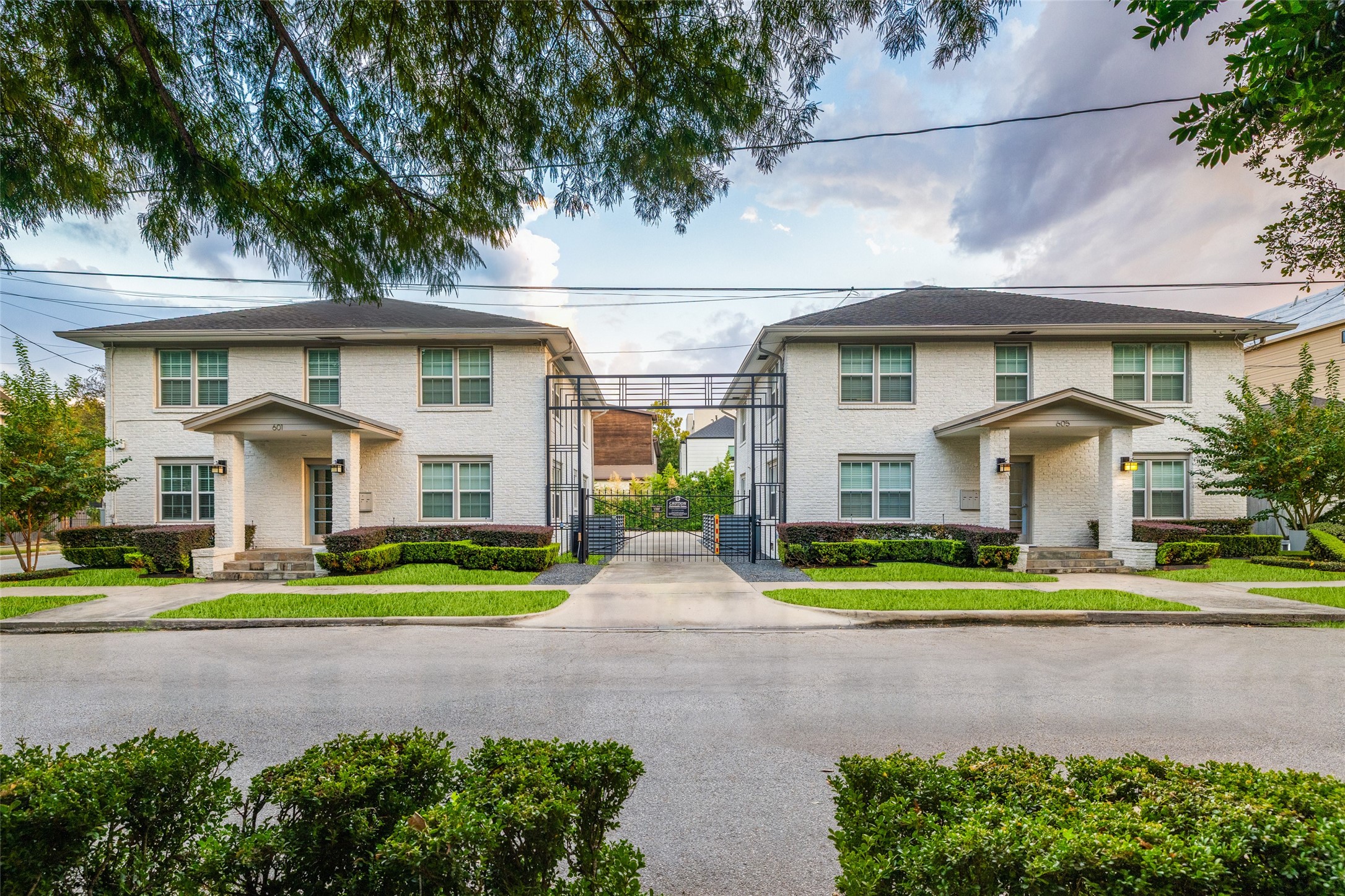 601 Bomar Street Houston, TX 77006 - Photo 4 of 28 a front view of a house with a yard and potted plants
