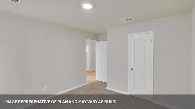 a bathroom with a bathtub and a toilet