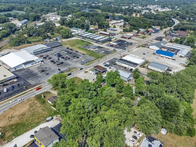 an aerial view of residential house with outdoor space