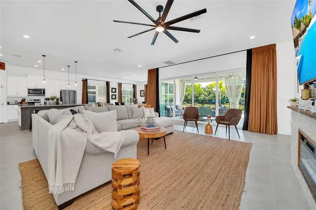a bedroom with a bed and a tv on the dresser