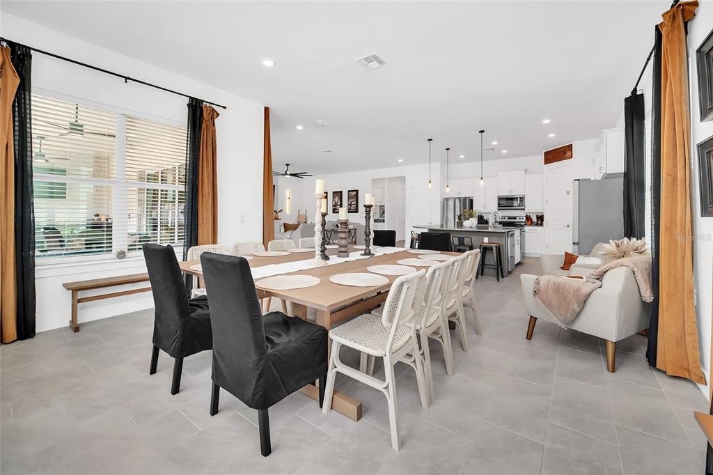 1213 Radiant Street Reunion, FL 34747 - Photo 34 of 84 a view of a dining room with furniture window and outside view