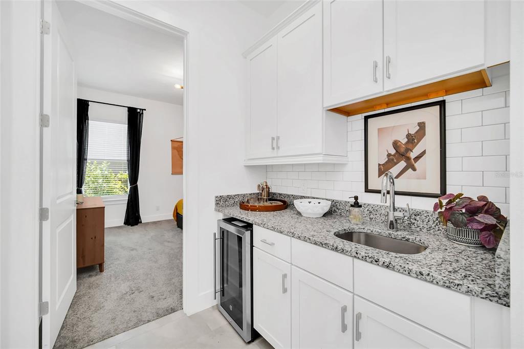 1213 Radiant Street Reunion, FL 34747 - Photo 48 of 84 a kitchen with sink and cabinets