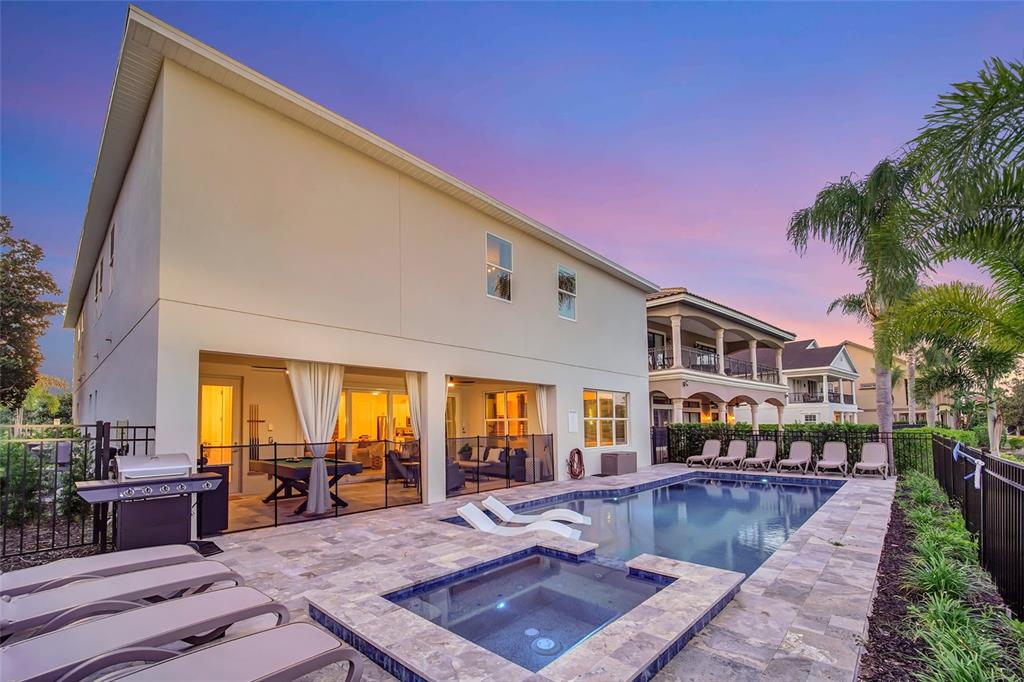 1213 Radiant Street Reunion, FL 34747 - Photo 80 of 84 a view of a house with swimming pool and sitting area