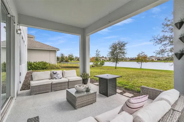 a view of a house with yard and green space
