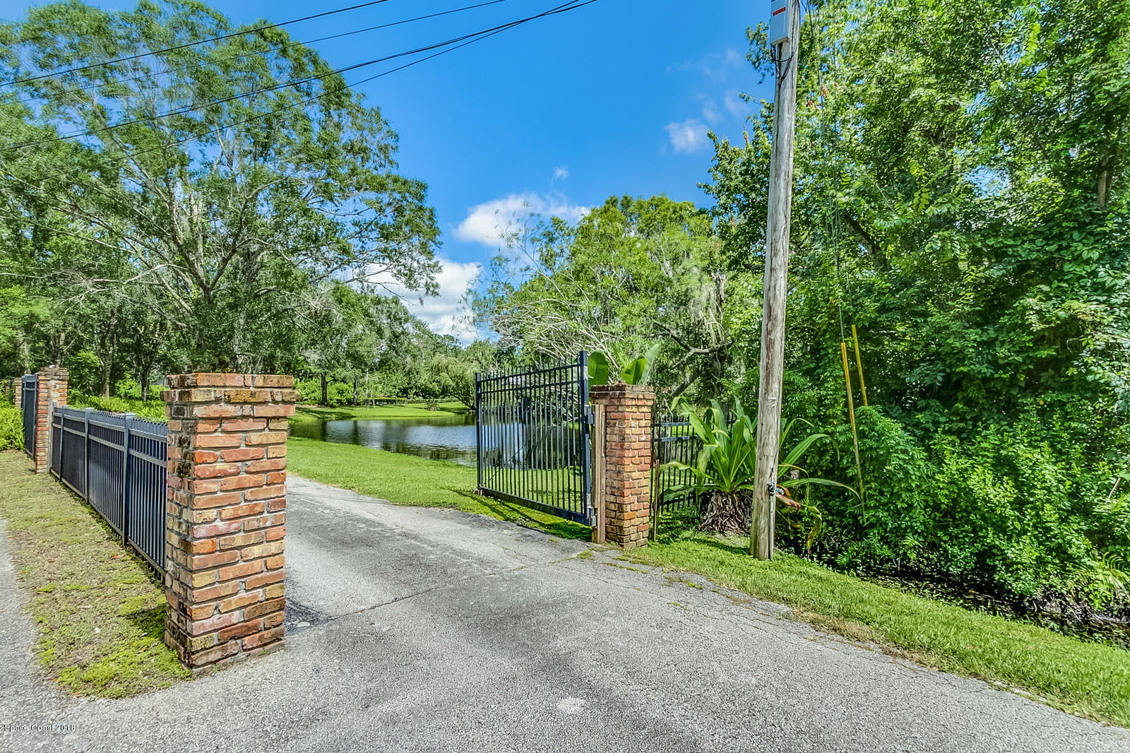2555 Cox Road Cocoa, FL 32926 - Photo 26 of 42 Gated Entry